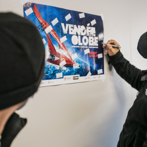 Skipper Kojiro Shiraishi is signing a poster before his last PCR test