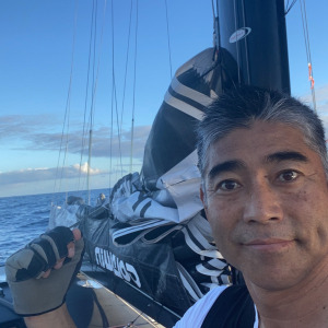 Kojiro Shiraishi is fixing his mainsail