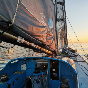 Didac Costa with a sunrise on the horizon