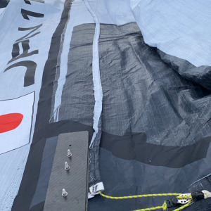 Kojiro Shiraishi repaired his mainsail