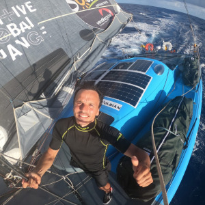 Spanish Didac Costa, happy aboard his boat One Planet One Ocean