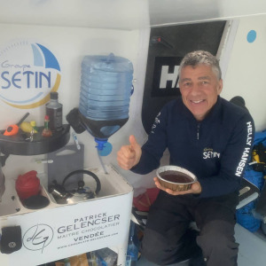 Manuel Cousin treats himself to a chocolate cake to celebrate his passage of the Cape of Good Hope