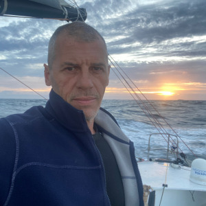 Sébastien Destremau in front of a beautiful sunset 