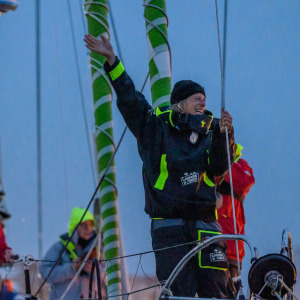 Miranda at the front of her boat during the ascent of the channel