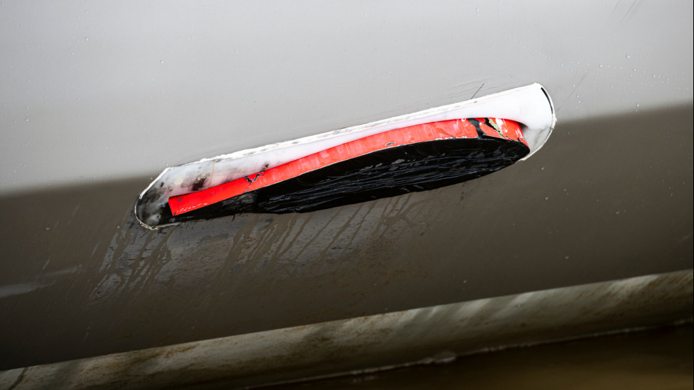 Boris Herrmann's damaged foil was cut off on arrival in Port Olona